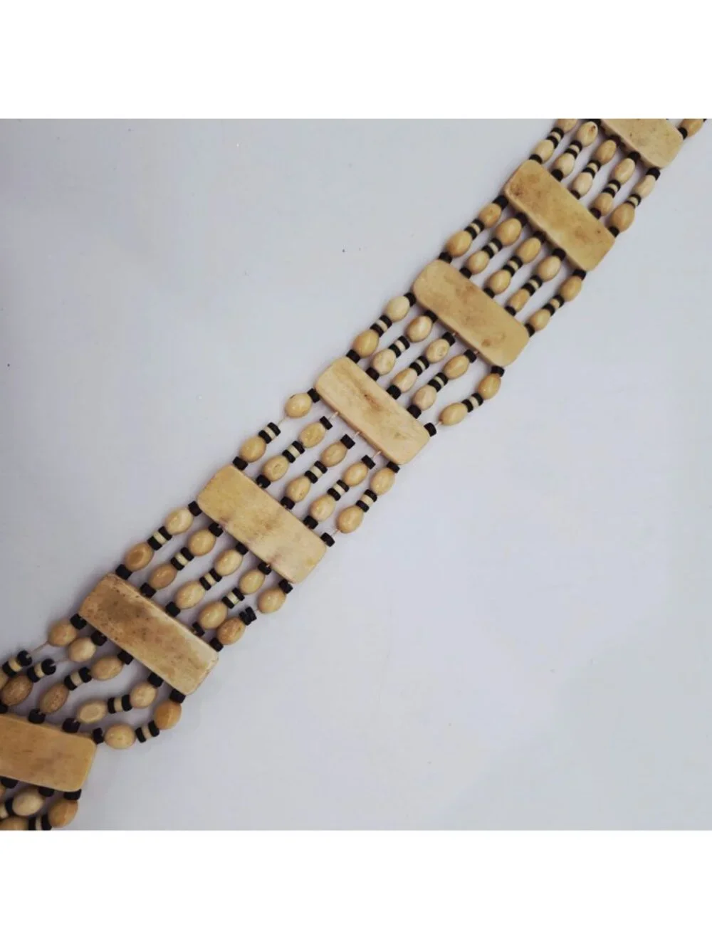 Hand-Carved Bone Beaded Belt With Intricate Leaf Pattern & Button Closure